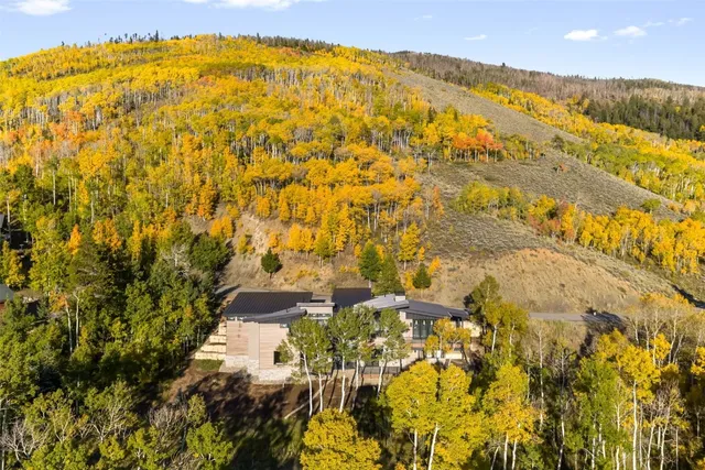 a view of residential houses with swimming pool