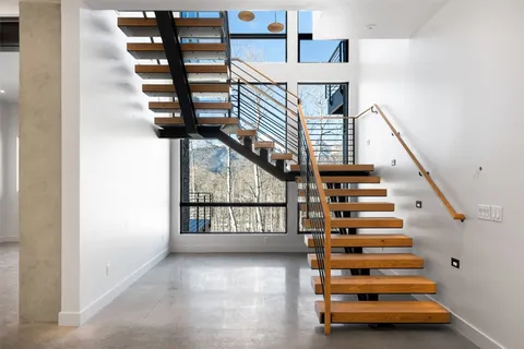 a view of entryway with a front door