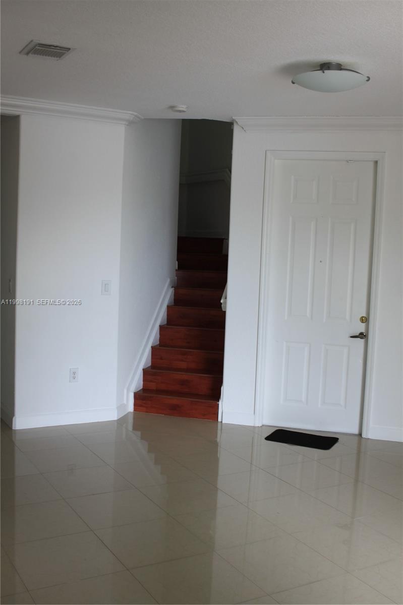 11675 Northwest 78th Lane Doral, FL 33178 - Photo 5 of 12 a view of entryway with wooden floor
