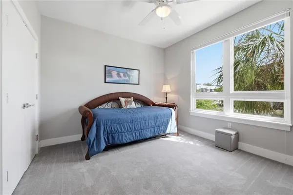 a kitchen with stainless steel appliances granite countertop a sink a stove and a wooden floors
