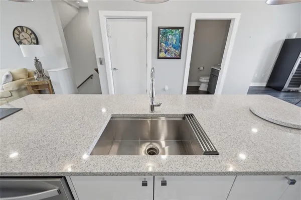 a view of a swimming pool with outdoor seating