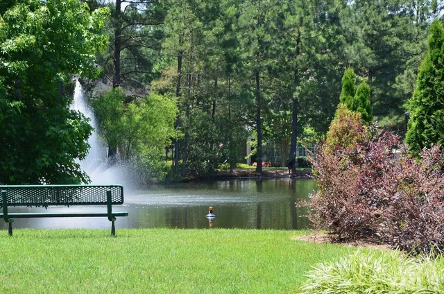 a view of lake with green space