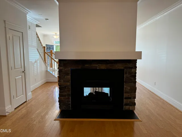 a living room with a fireplace