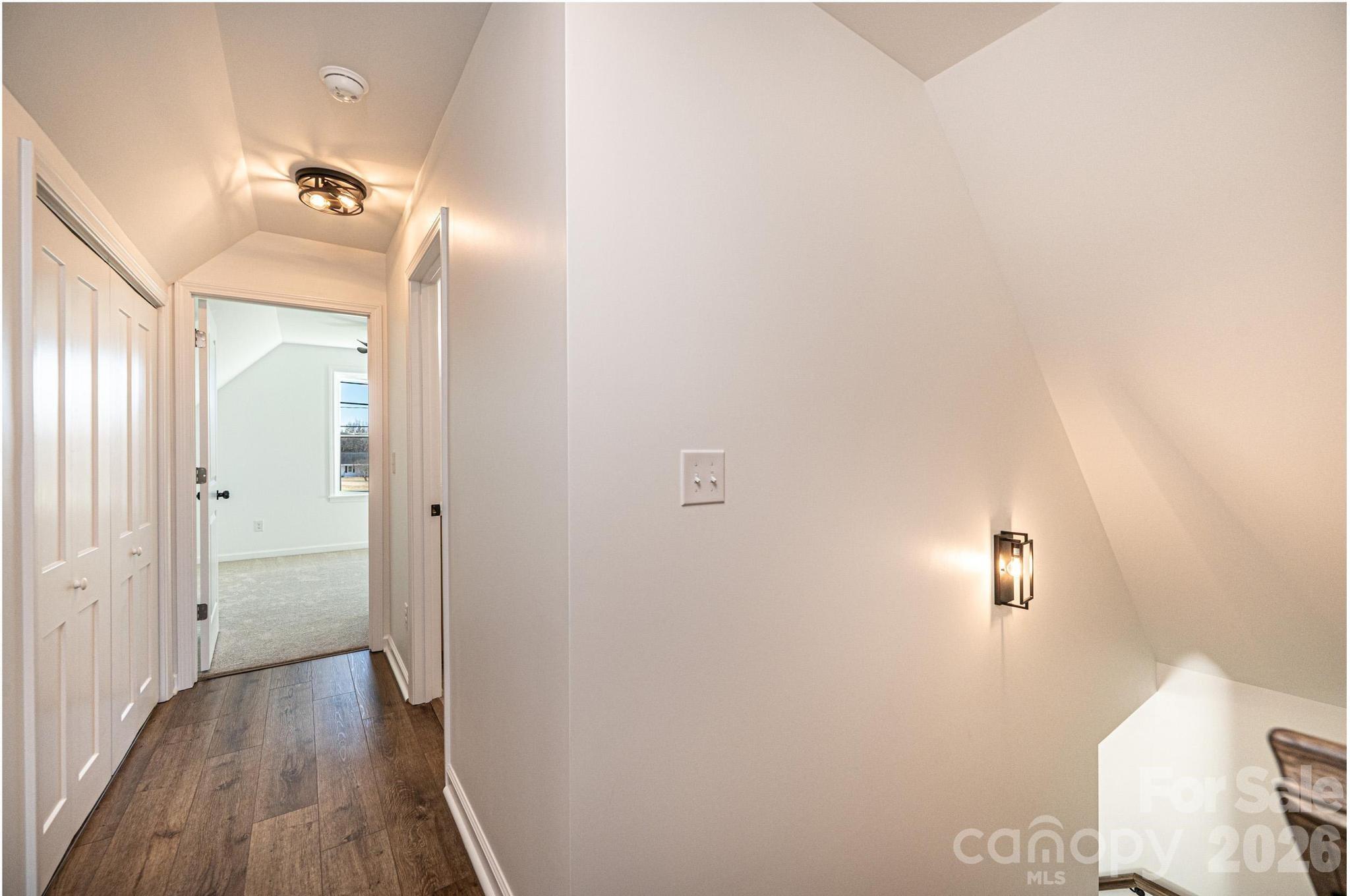 200 North Center Street Hildebran, NC 28637 - Photo 22 of 29 a view of a hallway with wooden floor