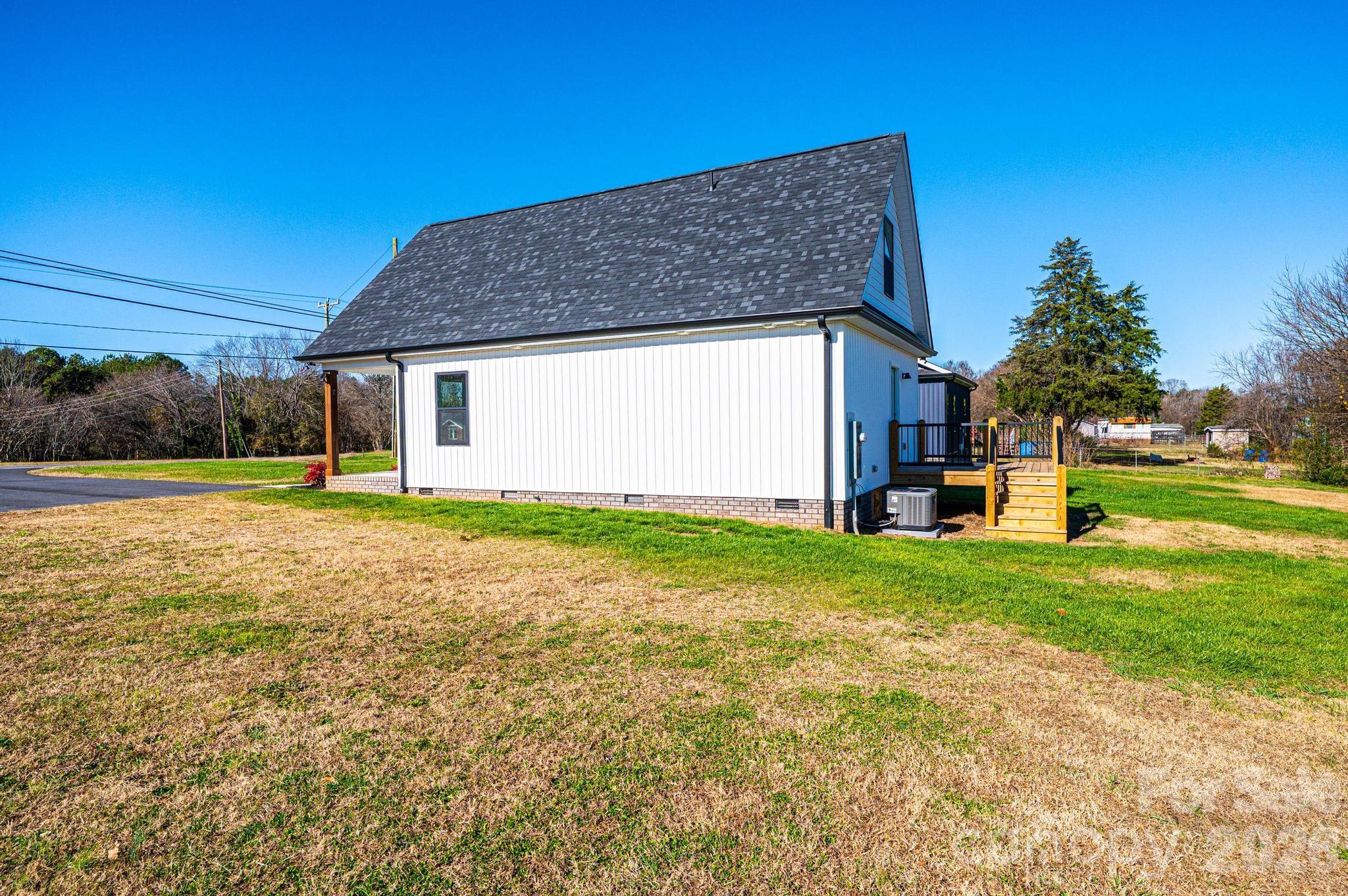 200 North Center Street Hildebran, NC 28637 - Photo 23 of 25 a front view of house with yard and green space