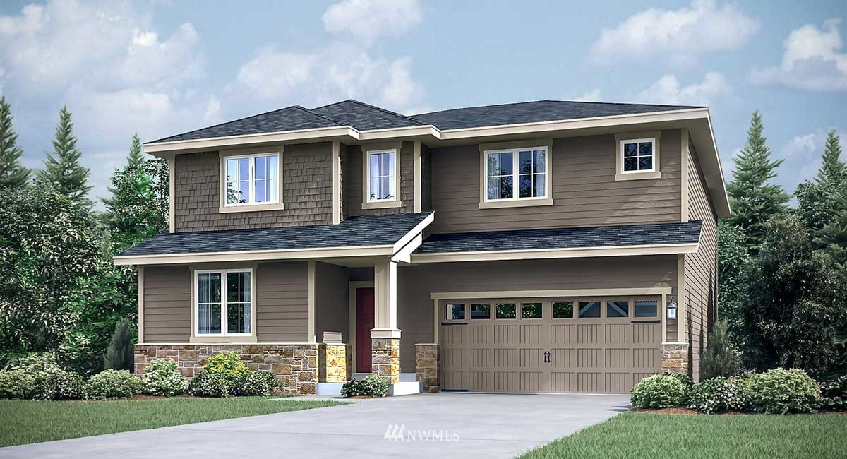 23507 41st Drive Southeast, Unit 35 Bothell, WA 98021 - Photo 1 of 4 a front view of a house with a garden and garage