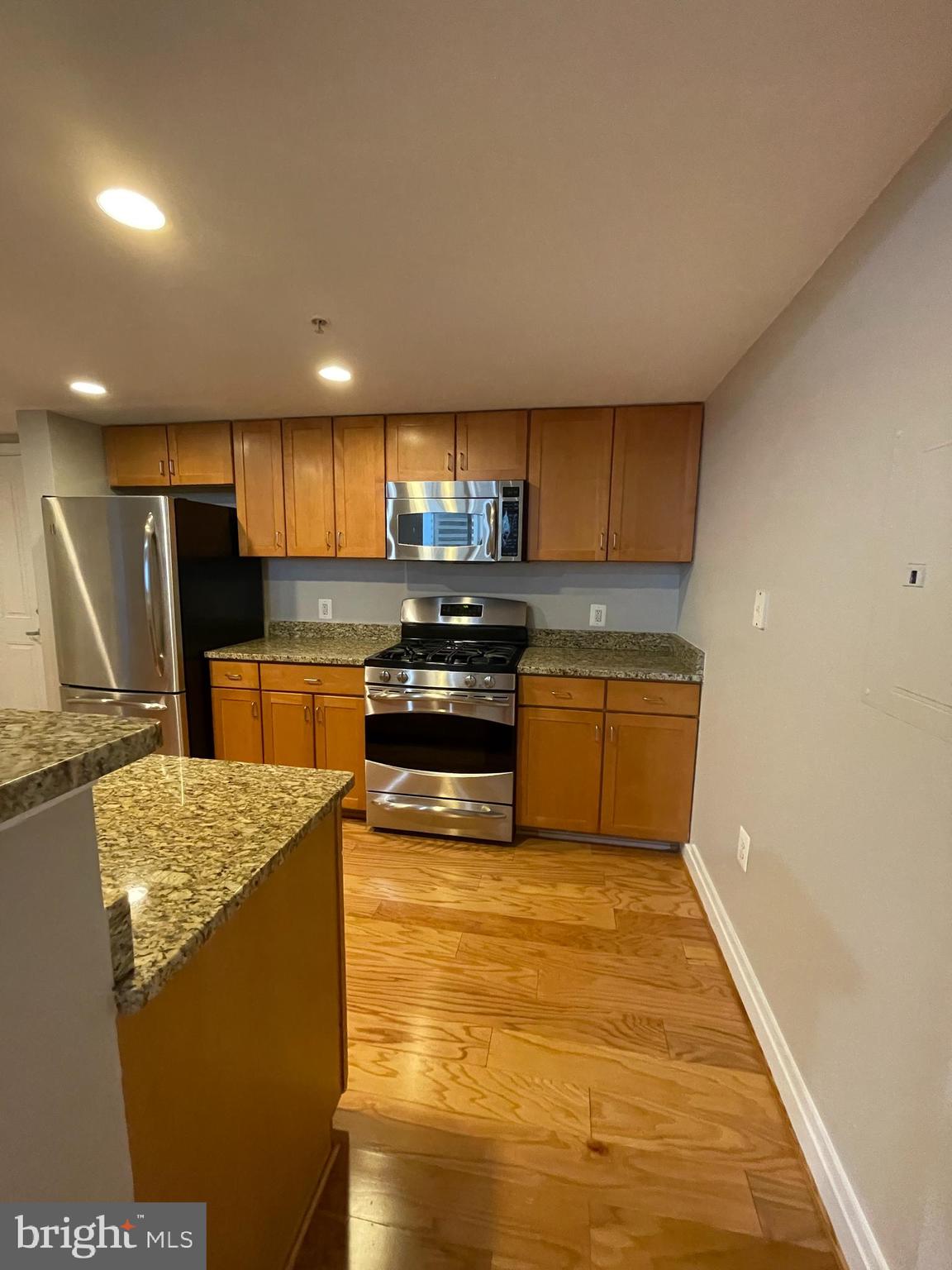 414 Water Street, Unit 2015 Baltimore, MD 21202 - Photo 6 of 30 Kitchen remodel with granite countertops