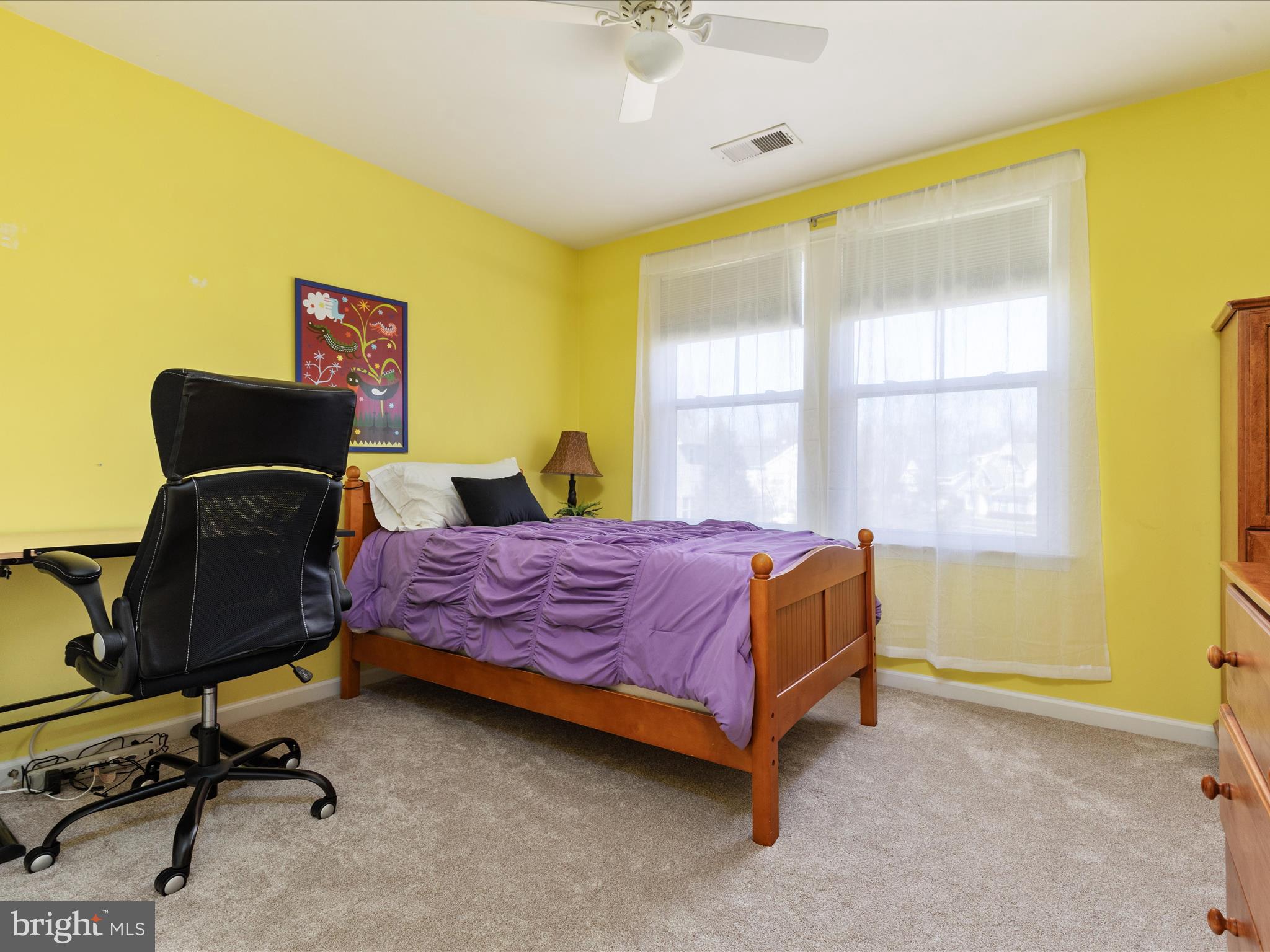 14353 Northbrook Lane Gainesville, VA 20155 - Photo 18 of 63 a bedroom with a bed chair and window