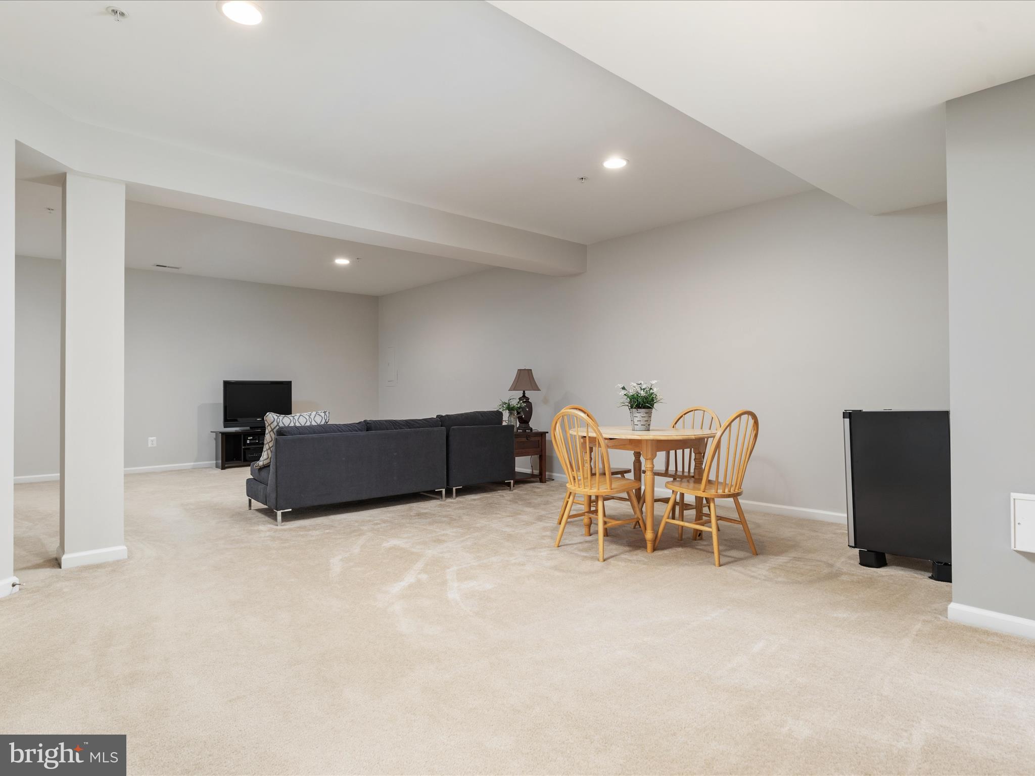 14353 Northbrook Lane Gainesville, VA 20155 - Photo 31 of 63 a bed room with furniture and a chair