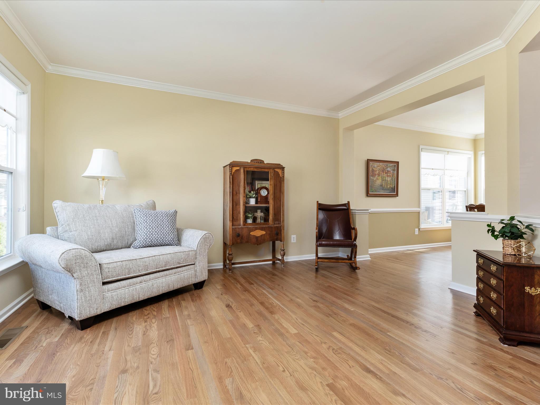 14353 Northbrook Lane Gainesville, VA 20155 - Photo 4 of 63 a living room with furniture and a wooden floor