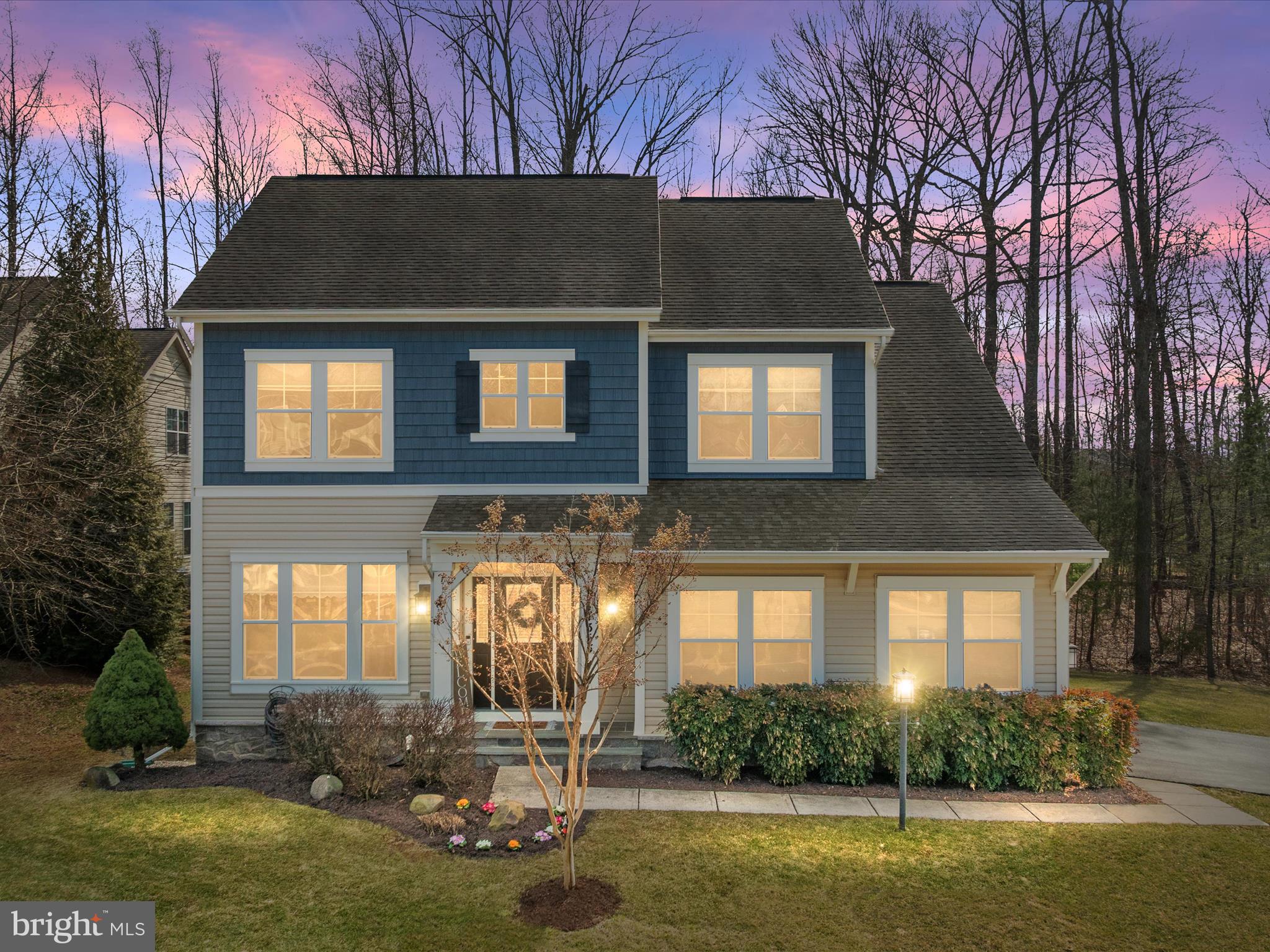 14353 Northbrook Lane Gainesville, VA 20155 - Photo 46 of 63 a front view of a house with garden