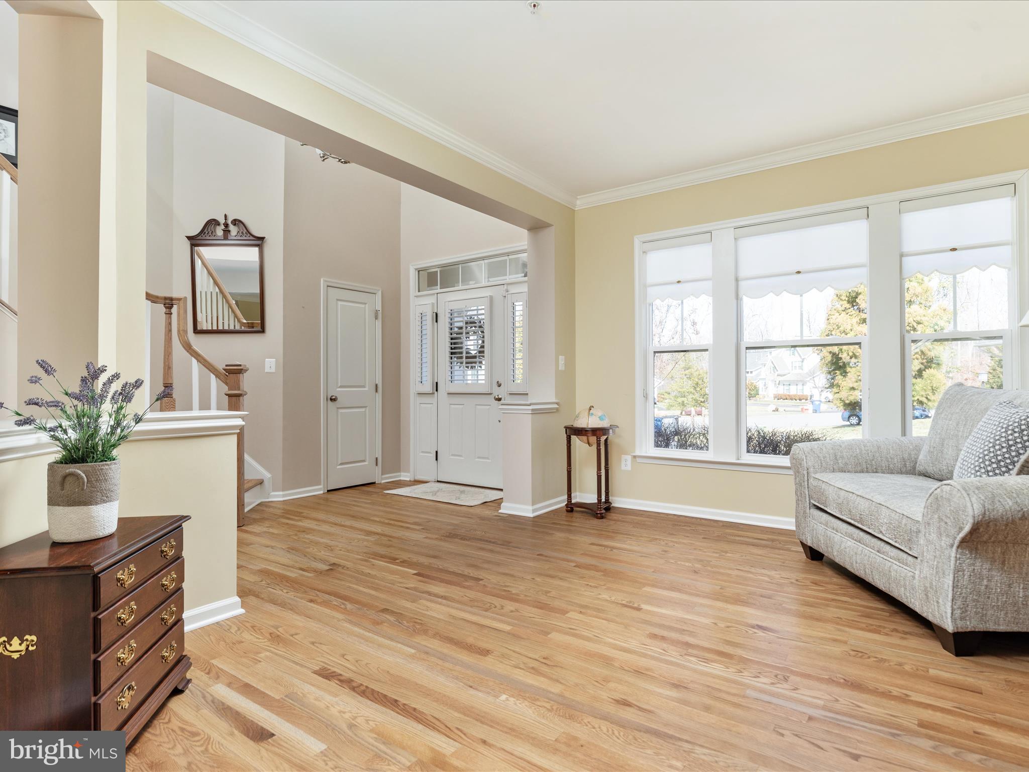 14353 Northbrook Lane Gainesville, VA 20155 - Photo 5 of 63 a living room with furniture and wooden floor