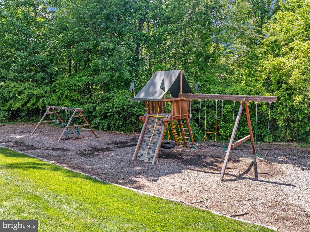 14353 Northbrook Lane Gainesville, VA 20155 - Photo 56 of 63 a view of a backyard with a slide