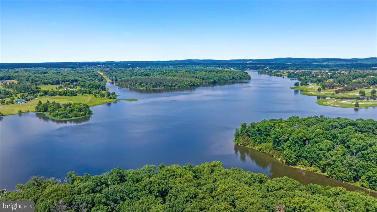 14353 Northbrook Lane Gainesville, VA 20155 - Photo 58 of 63 an aerial view of a houses with a lake view