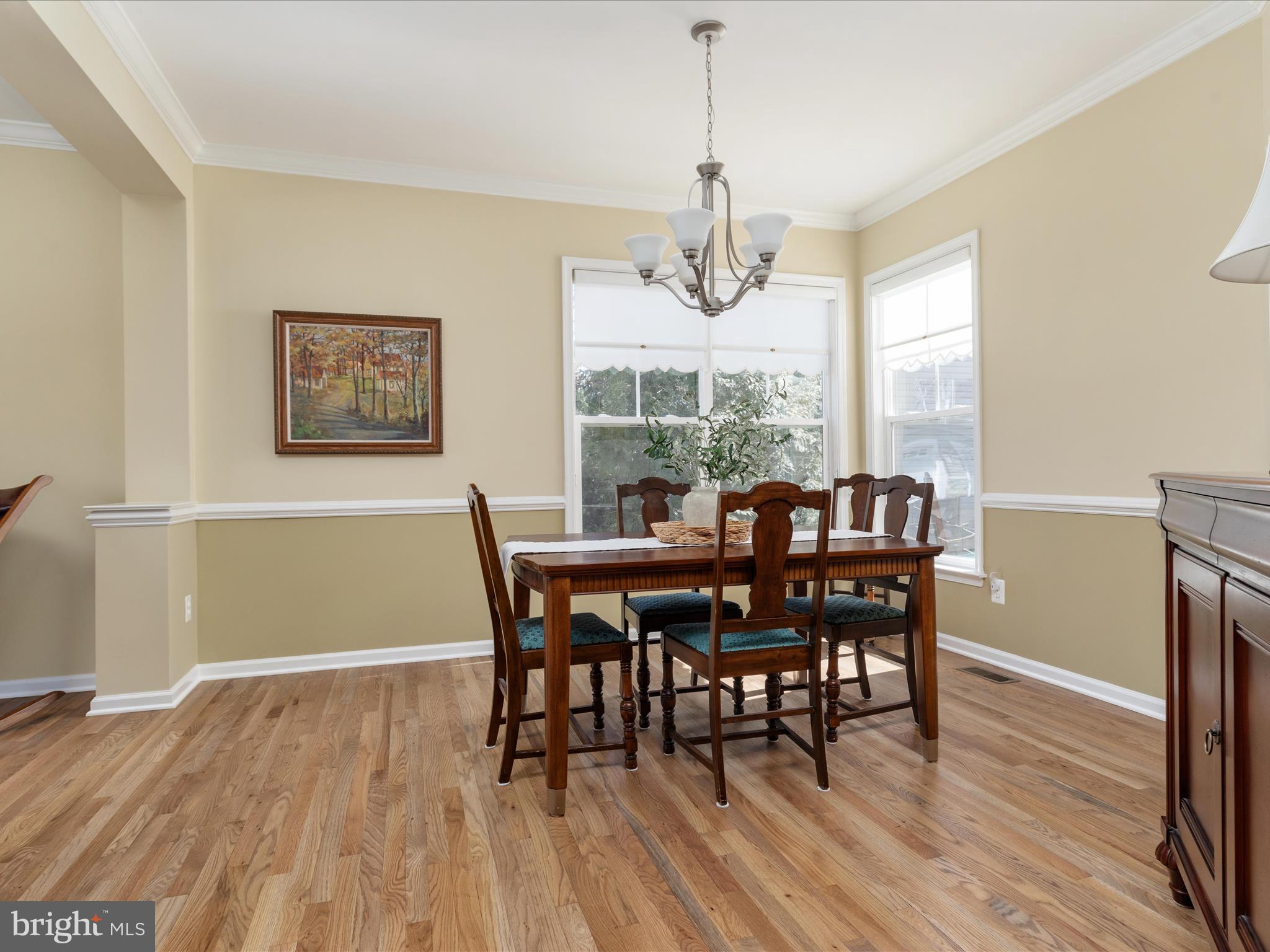 14353 Northbrook Lane Gainesville, VA 20155 - Photo 6 of 63 a view of a dining room with furniture window and wooden floor