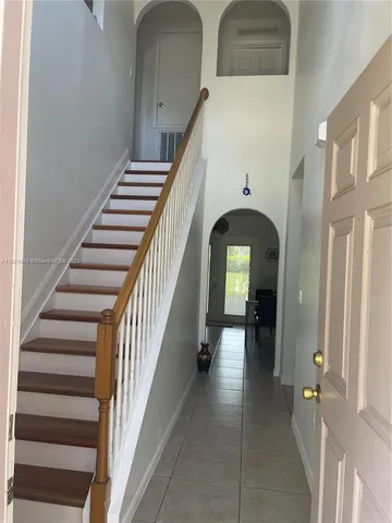 a view of a workspace with furniture