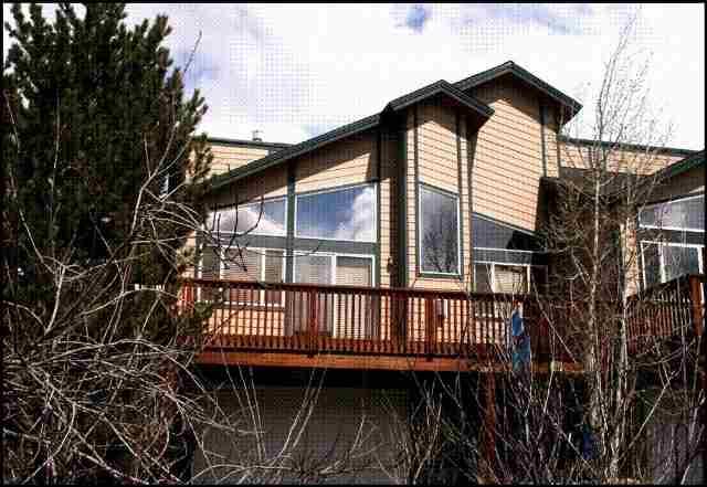 46 Pine Ridge Road, Unit 5 Basalt, CO 81621 - Photo 1 of 9 a view of a house with a small yard and wooden floor and fence