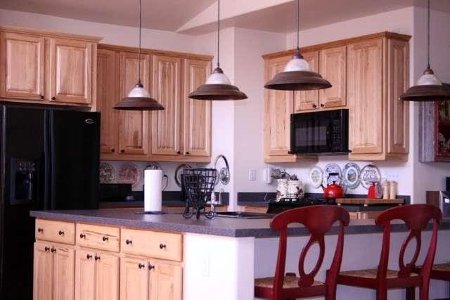 46 Pine Ridge Road, Unit 5 Basalt, CO 81621 - Photo 4 of 9 a kitchen with stainless steel appliances a stove a sink and a microwave