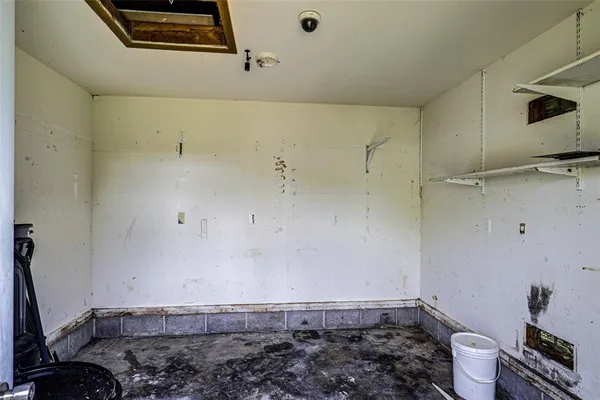 a swimming pool with yard and outdoor seating