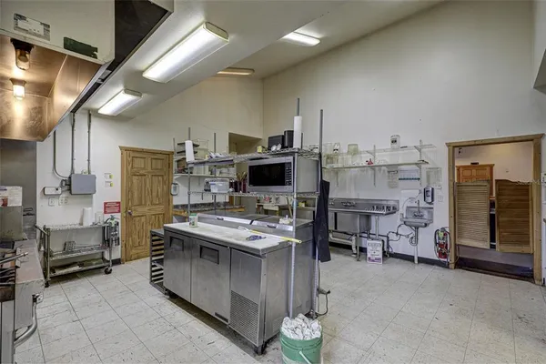 a view of a hallway with a couch