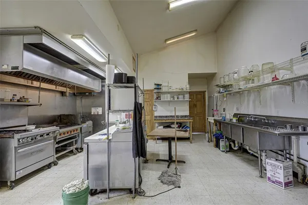 a front view of a house with racks