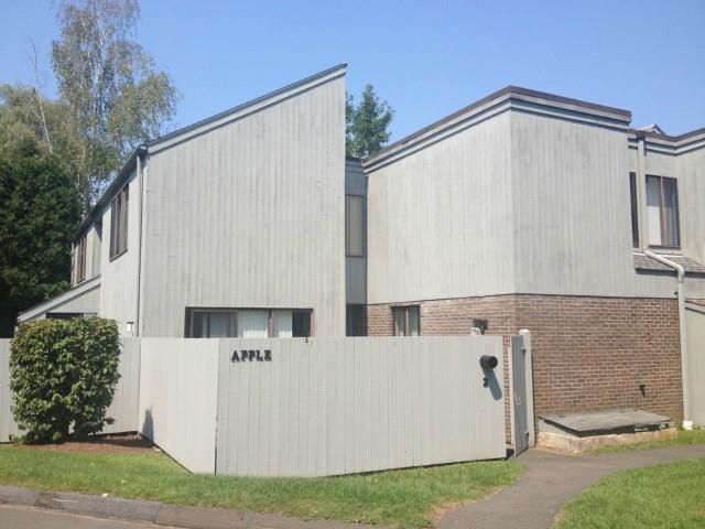a view of a house with backyard