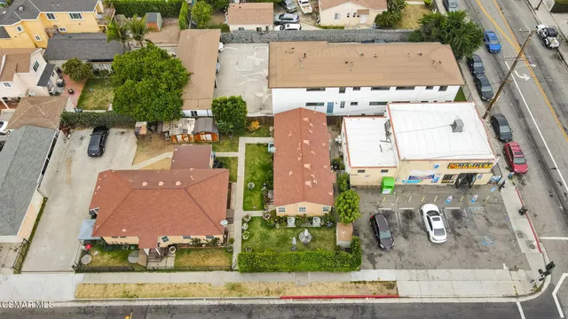 an aerial view of a house with a garden