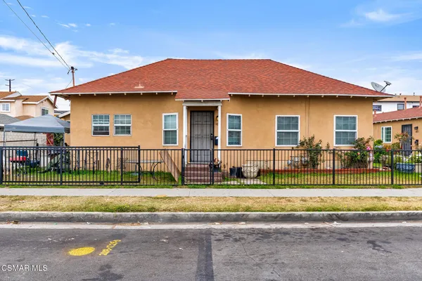 a front view of a house with a patio