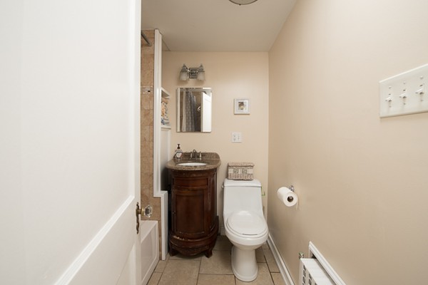 28 Partridge Road Weymouth, MA 02190 - Photo 17 of 22 a bathroom with a toilet and a sink