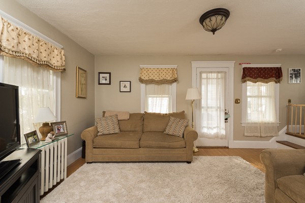 28 Partridge Road Weymouth, MA 02190 - Photo 3 of 22 a living room with furniture and a flat screen tv