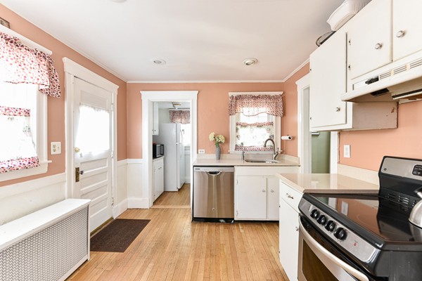 28 Partridge Road Weymouth, MA 02190 - Photo 6 of 22 a kitchen with stove and white cabinets