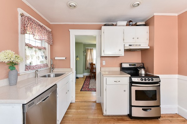 28 Partridge Road Weymouth, MA 02190 - Photo 9 of 22 a kitchen with a stove and a sink
