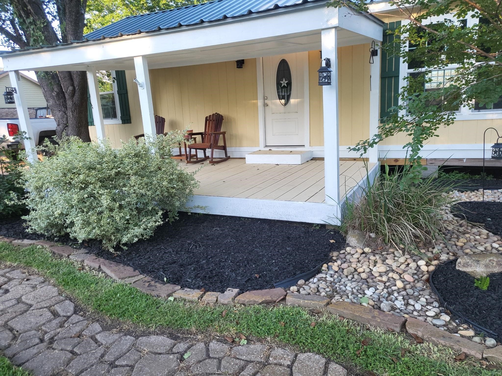 639 Manor Street Houston, TX 77015 - Photo 2 of 31 a view of a house with backyard and garden