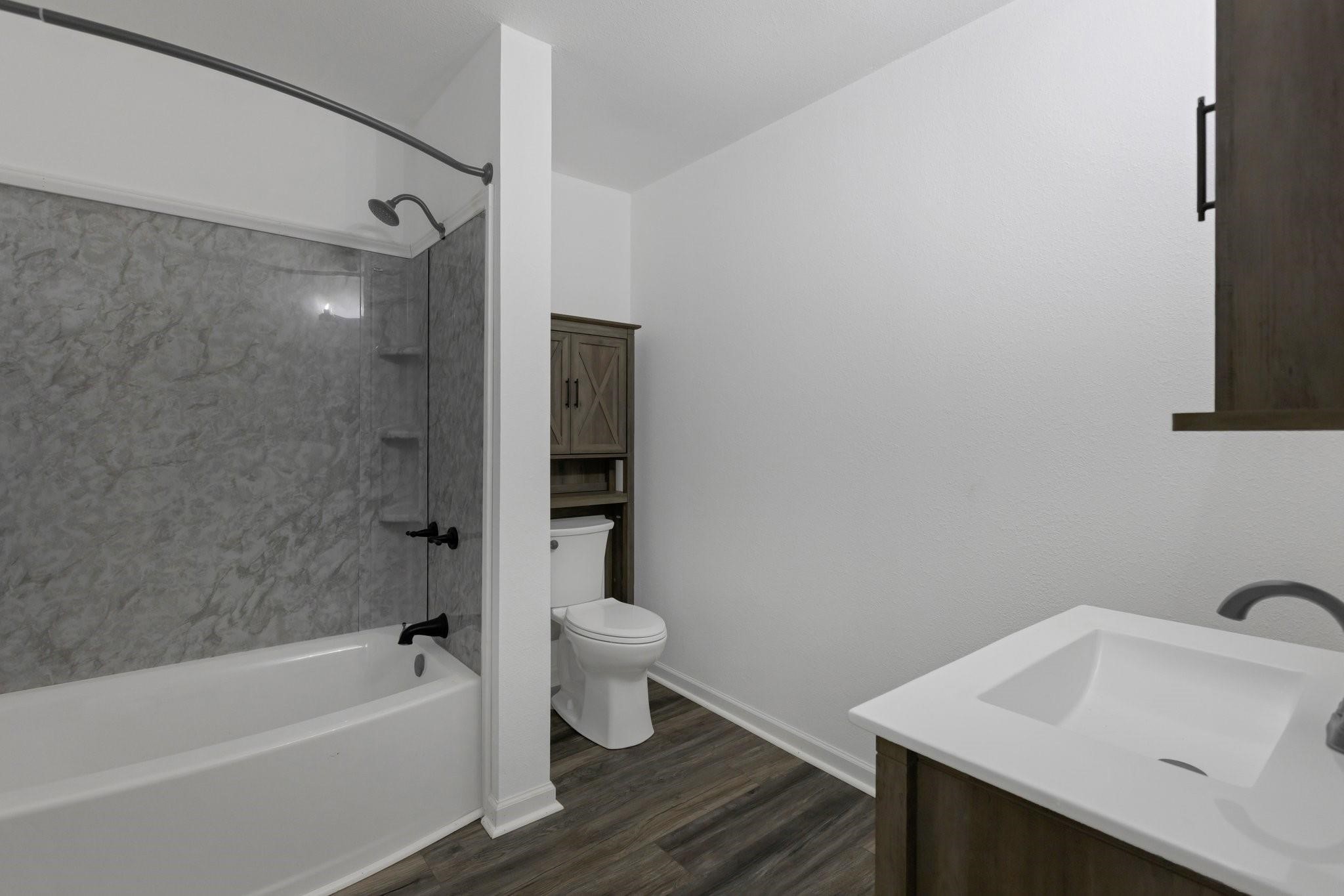 639 Manor Street Houston, TX 77015 - Photo 25 of 31 a bathroom with a sink toilet and shower