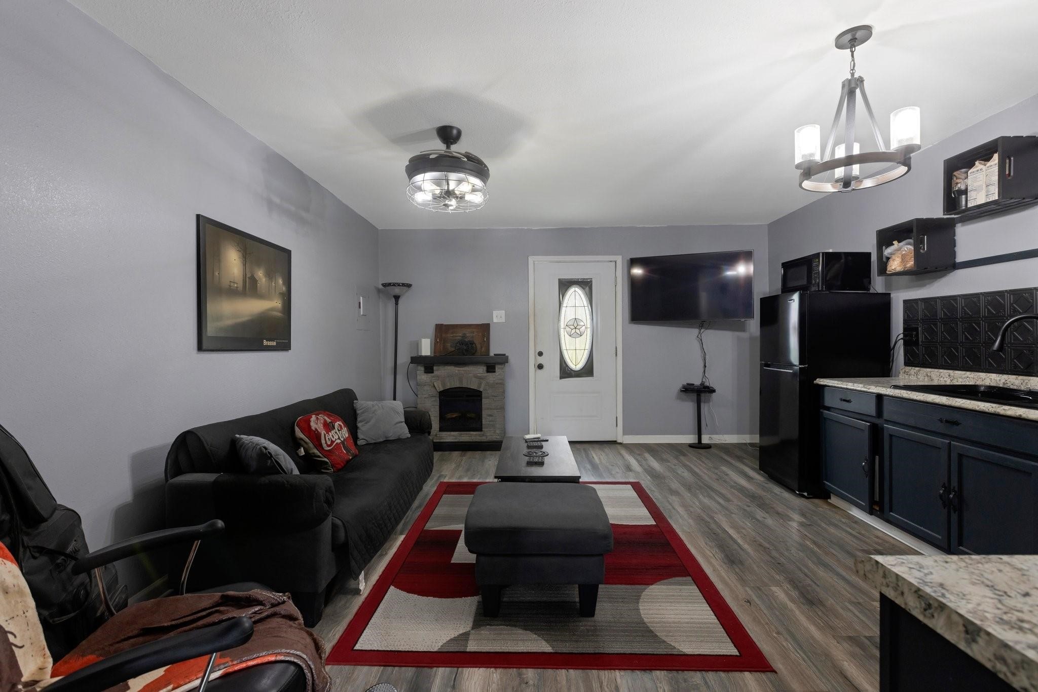 639 Manor Street Houston, TX 77015 - Photo 29 of 31 a kitchen with stainless steel appliances granite countertop sink stove top oven and cabinets