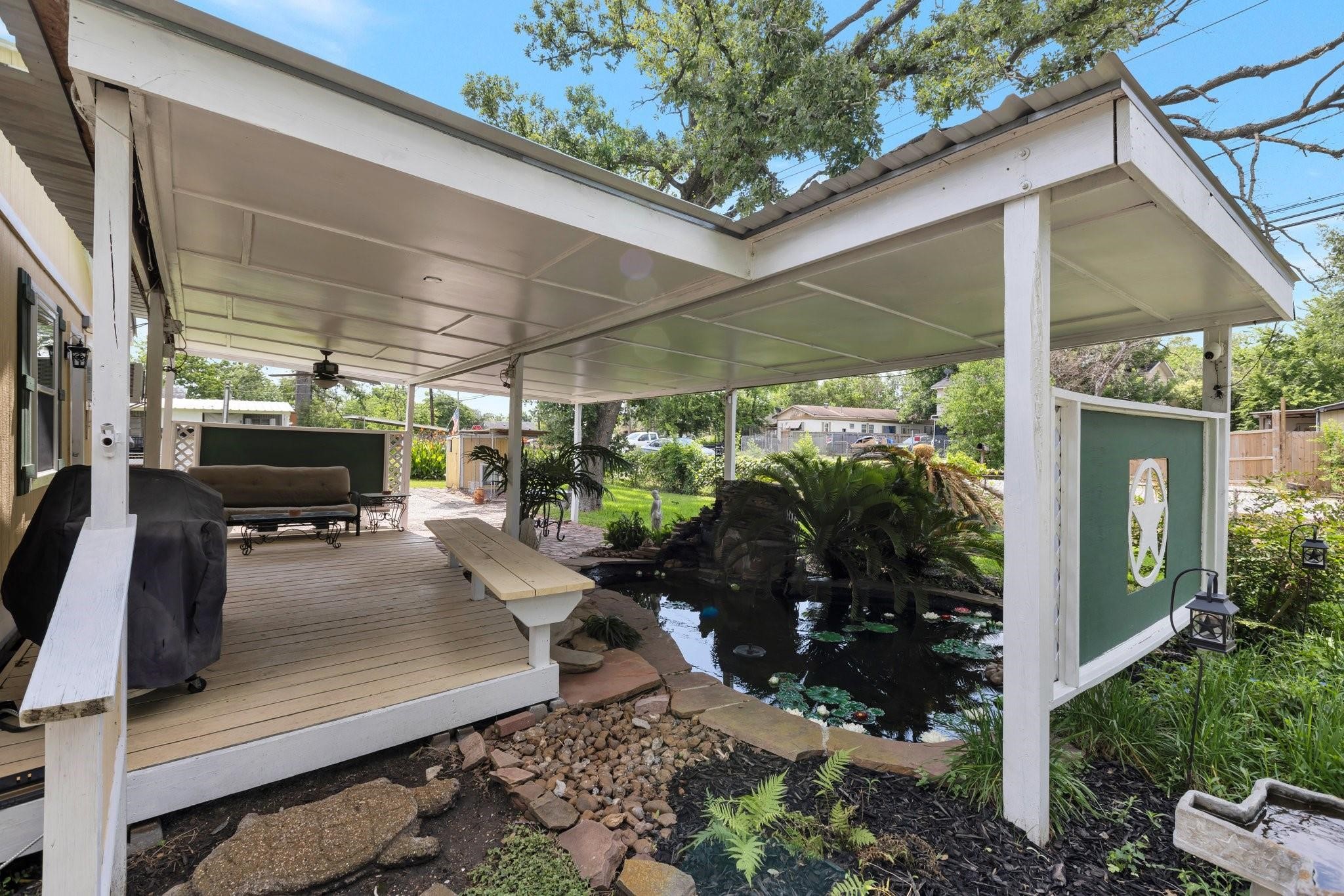 639 Manor Street Houston, TX 77015 - Photo 7 of 31 a view of a patio with table and chairs potted plants