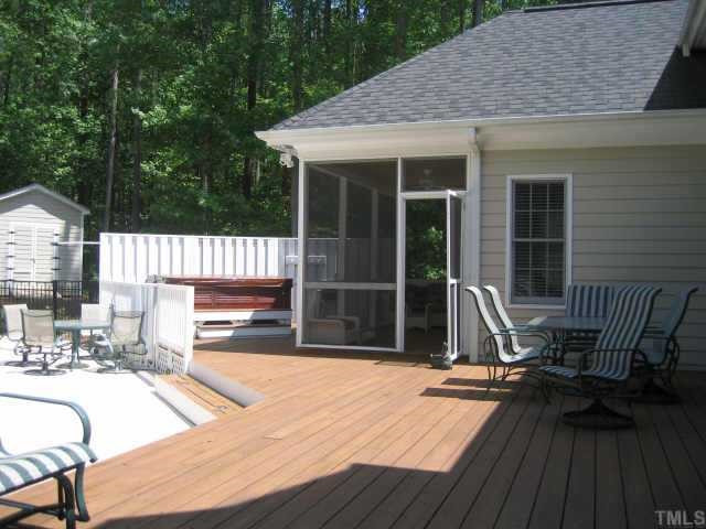 5904 Weather Rock Court Raleigh, NC 27613 - Photo 2 of 8 Outside Living with at it's finest,step out from kitchen and great room to deck and pool Other