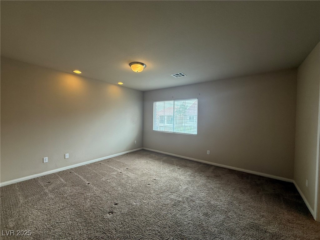 6830 Philharmonic Avenue Las Vegas, NV 89139 - Photo 11 of 28 Primary bedroom with ceiling light