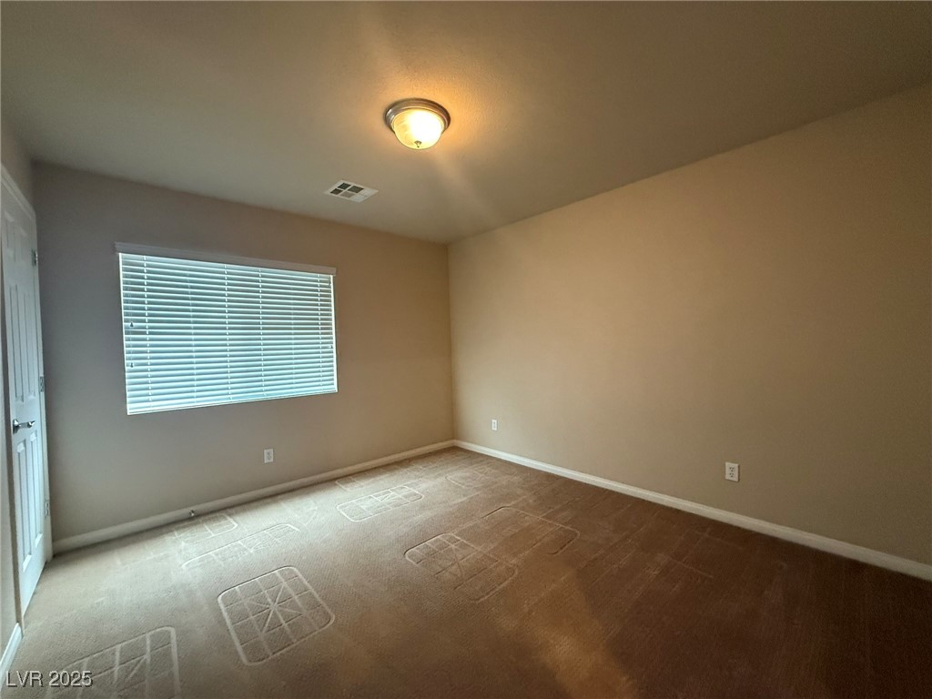6830 Philharmonic Avenue Las Vegas, NV 89139 - Photo 22 of 28 Bedroom #3 with ceiling light