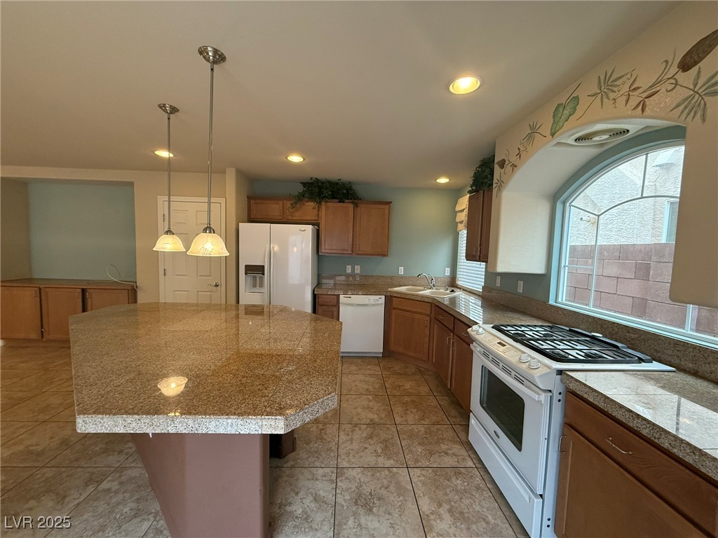 6830 Philharmonic Avenue Las Vegas, NV 89139 - Photo 7 of 28 Kitchen featuring light tile patterned floors, whi