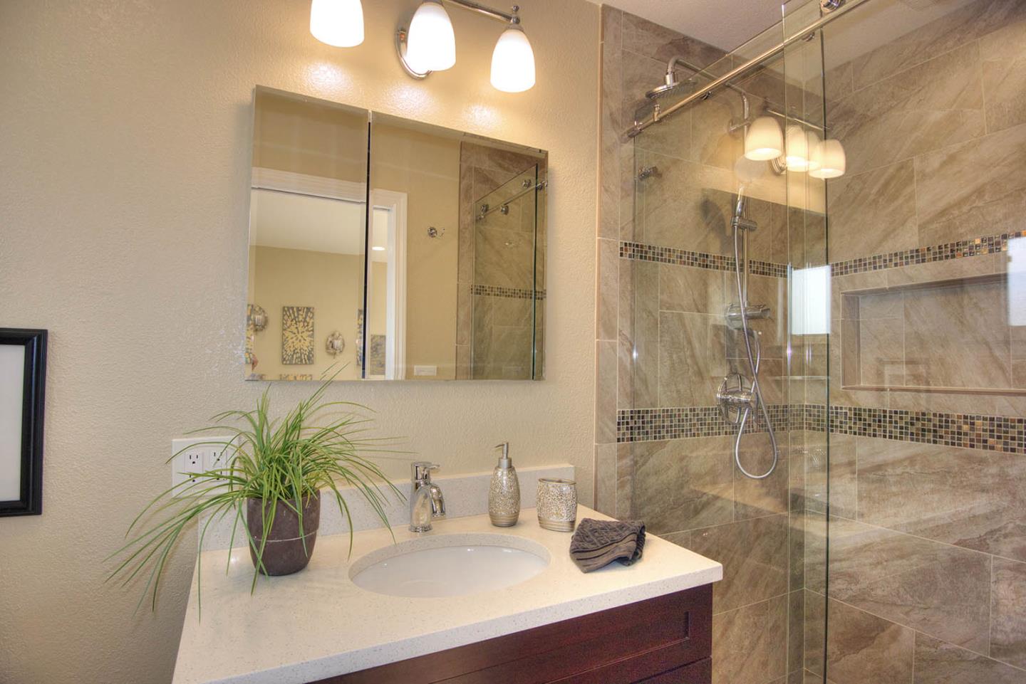 3792 Savannah Road Fremont, CA 94538 - Photo 17 of 37 a bathroom with a sink and a mirror