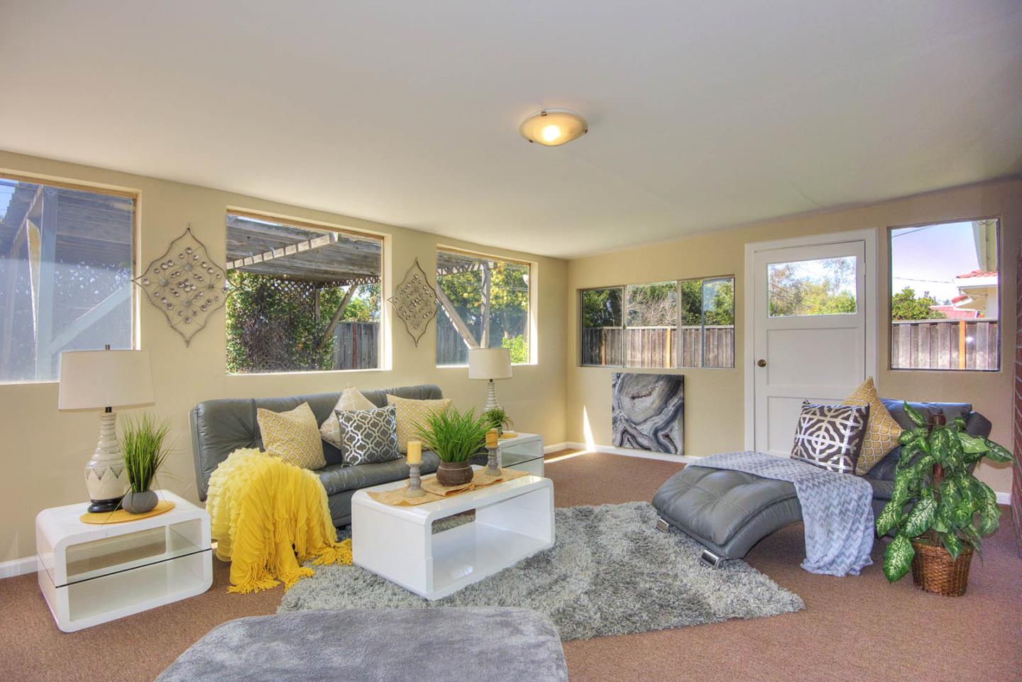 3792 Savannah Road Fremont, CA 94538 - Photo 27 of 37 a living room with furniture and a potted plant
