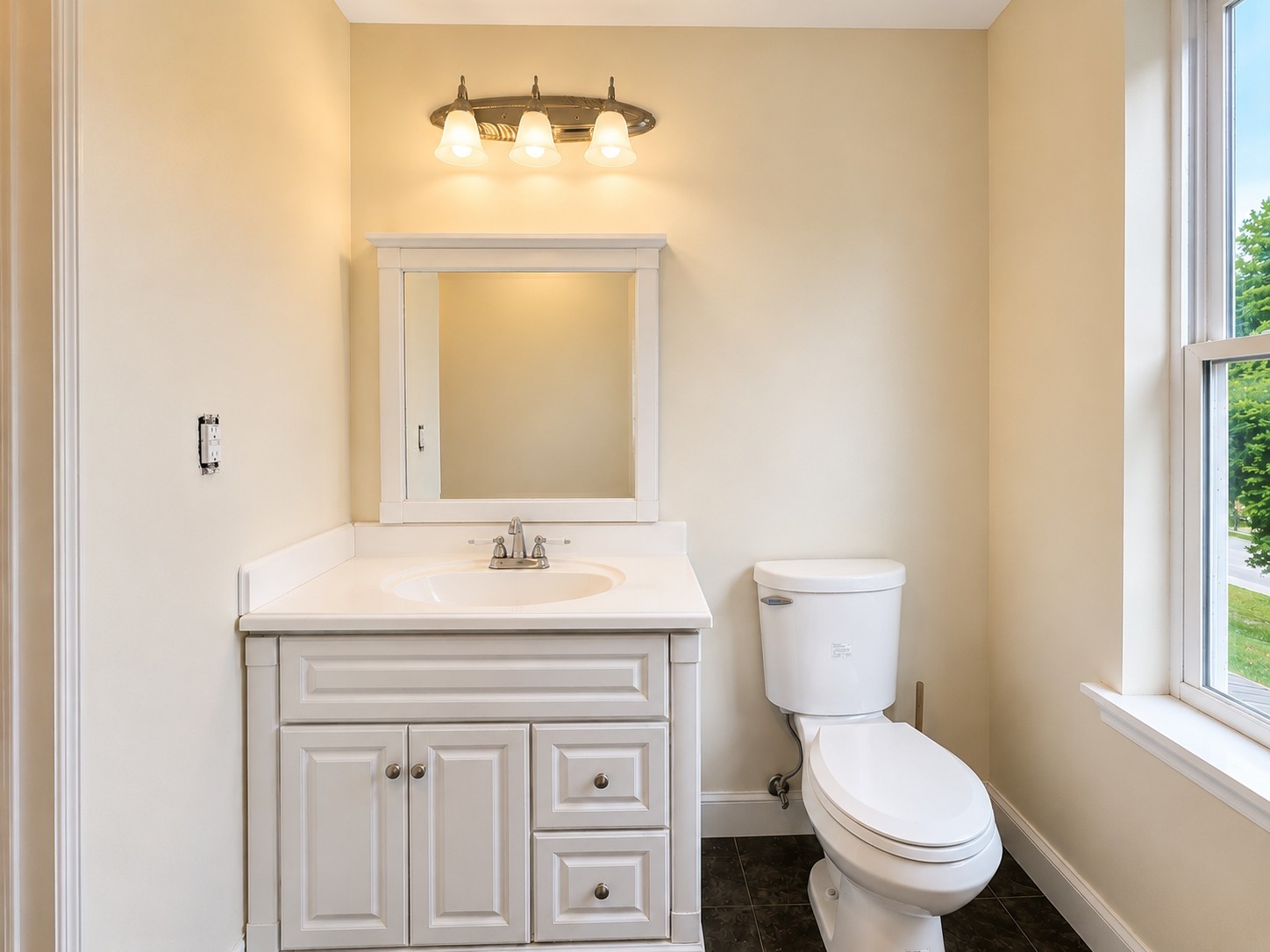 352 Main Street Cerulean, KY 42215 - Photo 21 of 32 a bathroom with a toilet a sink and a mirror