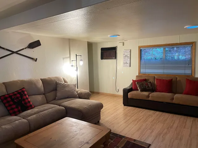 a living room with furniture and a couch