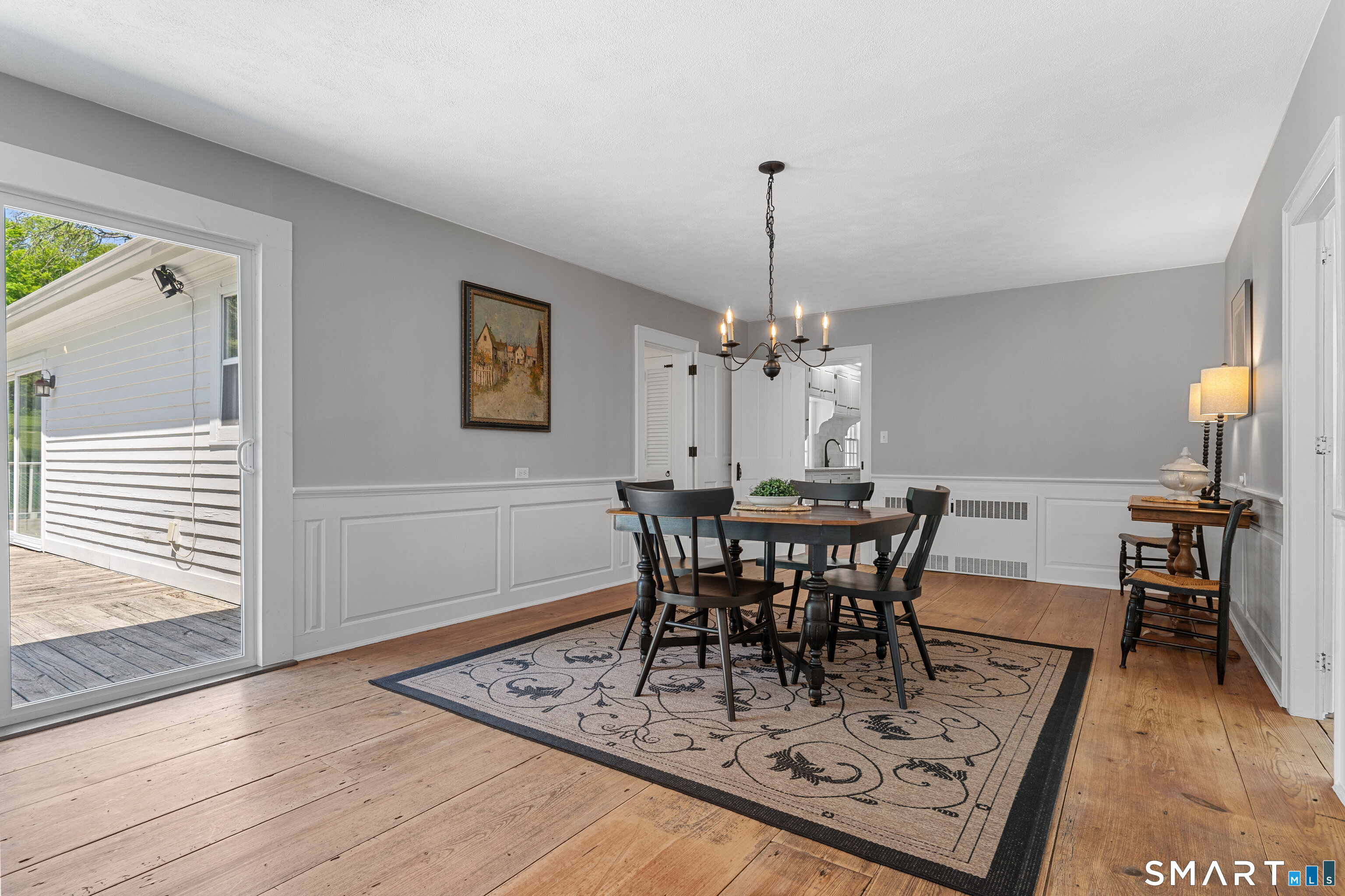 93 Upton Road Ashford, CT 06278 - Photo 9 of 40 Natural light illuminates rooms through several sliding glass doors creating a natural flow for indoor/outdoor living & entertaining.