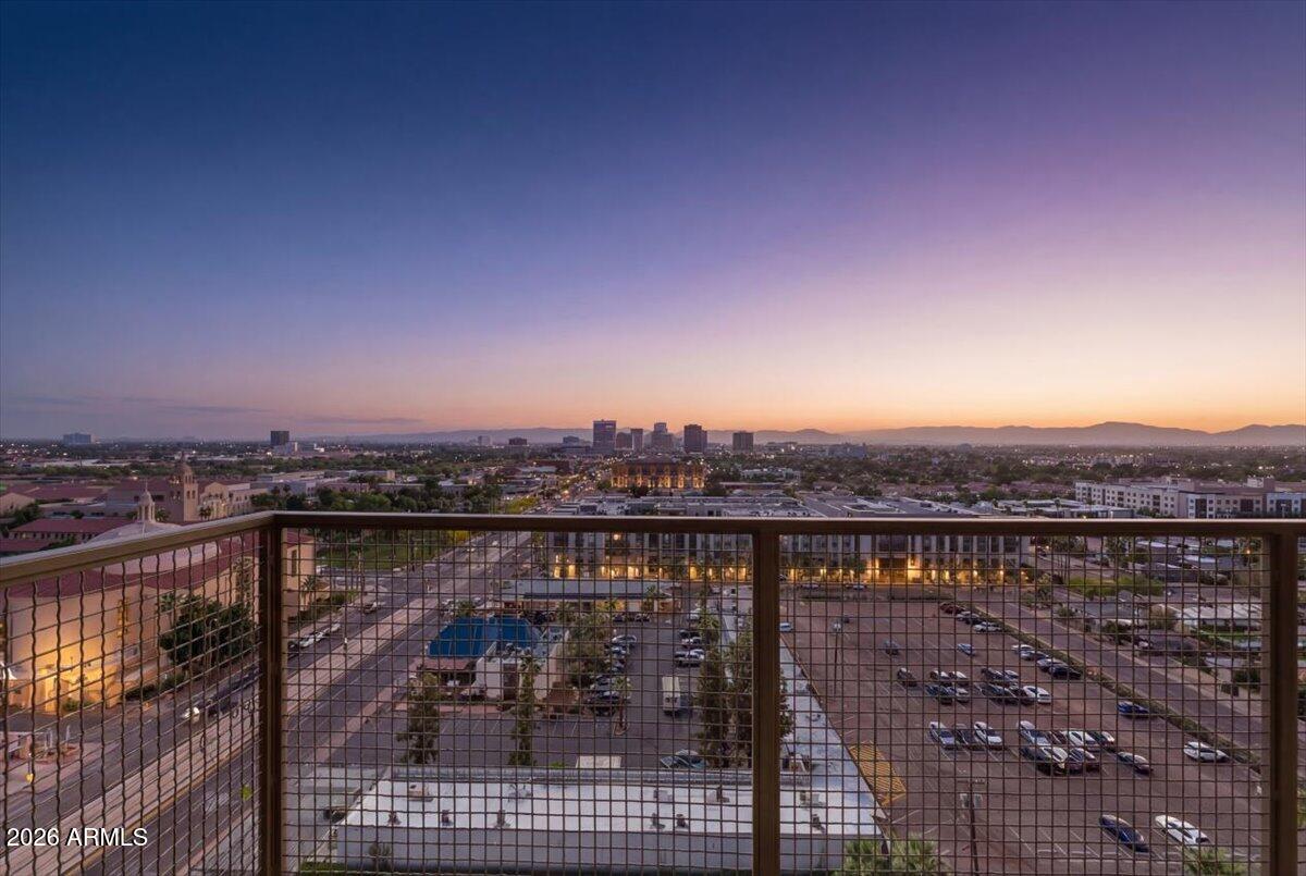 4750 North Central Avenue, Unit B14 Phoenix, AZ 85012 - Photo 24 of 57 a view of a lake with a city skyline in the background