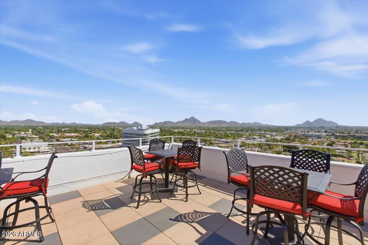 4750 North Central Avenue, Unit B14 Phoenix, AZ 85012 - Photo 36 of 57 a view of a chairs and table in the terrace