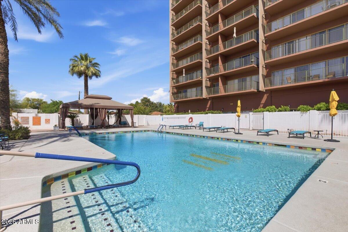 4750 North Central Avenue, Unit B14 Phoenix, AZ 85012 - Photo 44 of 57 a swimming pool with a outdoor seating