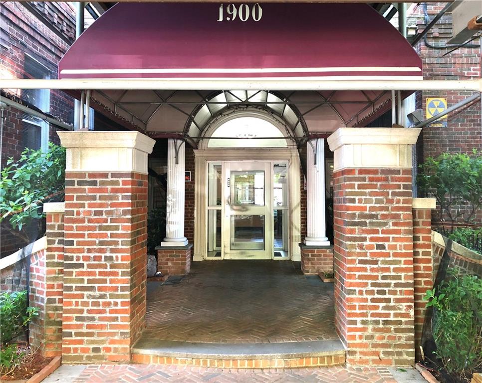 1900 Quentin Road, Unit E5 Brooklyn, NY 11229 - Photo 1 of 17 a front view of a building with glass windows