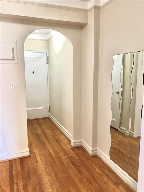1900 Quentin Road, Unit E5 Brooklyn, NY 11229 - Photo 11 of 17 a view of a room with wooden floor